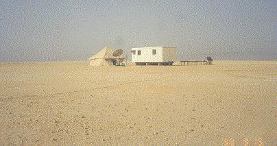 canvas tent next to satellite dish